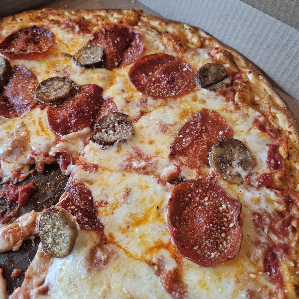 Goodfellas Pizzeria - Gulch - Pepperoni and Italian sausage pizza - Pizza Near Me - Nashville, Tennessee Goodfellas Pizzeria - Gulch - Pepperoni and Italian sausage pizza - Pizza Near Me - Nashville, Tennessee