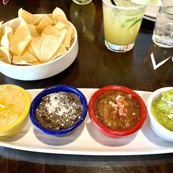 Urban Agave - Four Dip Appetizers of Queso, Guacamole, Salsa and Spicy Bean Dip - Gastropubs Near Me - Glendale, Arizona