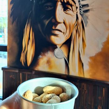 Old Wild West - I'm saluting him with my bucket of peanuts and I don't think he's buying, as in, "What, are you insulting me?" - Steakhouses Near Me - Montesilvano, Prince Edward Island