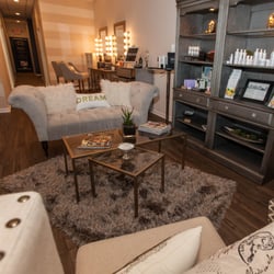 Lady Red Lash Studio - Trendy lounge seating when you walk in.