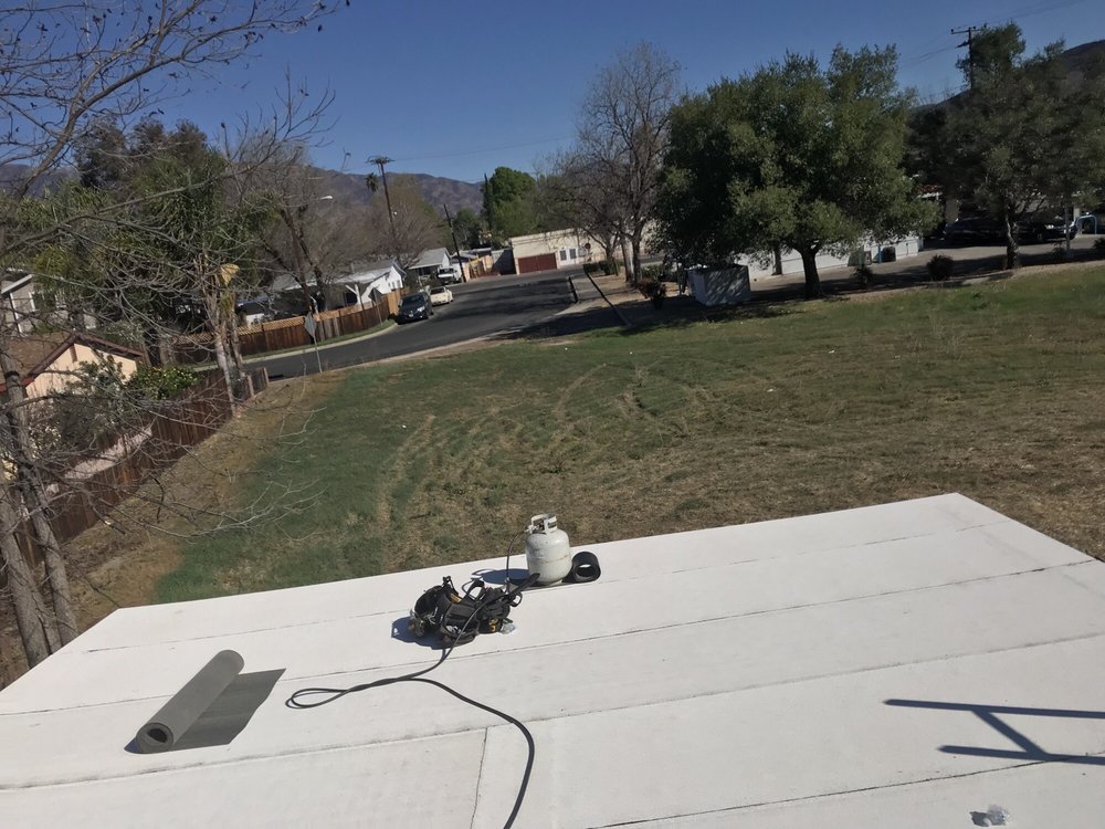 Slide of Aztec Roofing
