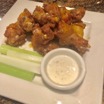 BJ's Restaurant & Brewhouse - Garlic Parmesan wings - New American Near Me - Webster, Texas