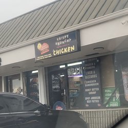 The storefront for Krispy Krunchy Chicken inside of the convenience store.