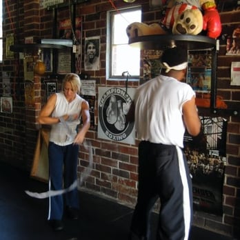 Decatur Boxing Club - Terri "The Boss" Moss and Xavier "Bad Pads" Biggs warming up - Trainers Near Me - Decatur, Georgia Decatur Boxing Club - Terri "The Boss" Moss and Xavier "Bad Pads" Biggs warming up - Trainers Near Me - Decatur, Georgia