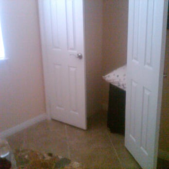 SNS Building Services - this was a built in desk that SNS turned into a closet with shelves - General Contractors Near Me