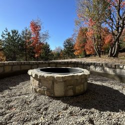 Salazar Construction & Maintenance - Stone fire pit and stone sitting area