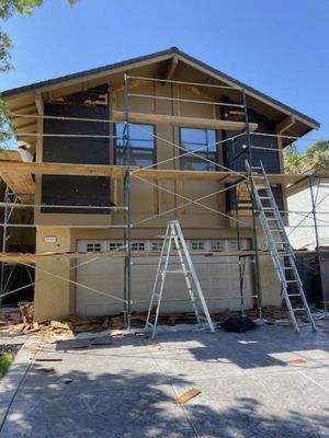 Project in Sacramento - We demoed the wood siding from the upper front and side walls, installed new Anlin windows, and applied a new lath and plaster insulated stucco system over the entire front of the house with an acrylic stucco finish. We also painted the back of the house to match the new front Project in Sacramento - We demoed the wood siding from the upper front and side walls, installed new Anlin windows, and applied a new lath and plaster insulated stucco system over the entire front of the house with an acrylic stucco finish. We also painted the back of the house to match the new front