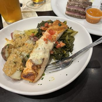 St Augustine Fish Camp - Grilled Salmon with Shallot Dill Butter, Collard Greens, Parsley Potatoes with Tasso Ham Gravy. Delicious! - Seafood Near Me - St Augustine, Florida