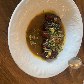 Homer - Grilled medjool dates w/ turmeric, fish sauce & pistachio oil - fantastic - Mediterranean Near Me - Seattle, Washington Homer - Grilled medjool dates w/ turmeric, fish sauce & pistachio oil - fantastic - Mediterranean Near Me - Seattle, Washington