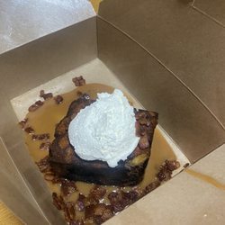 Sandberg Foodwares - Fried banana bread pudding. Topped with bacon and peanut butter sauce.