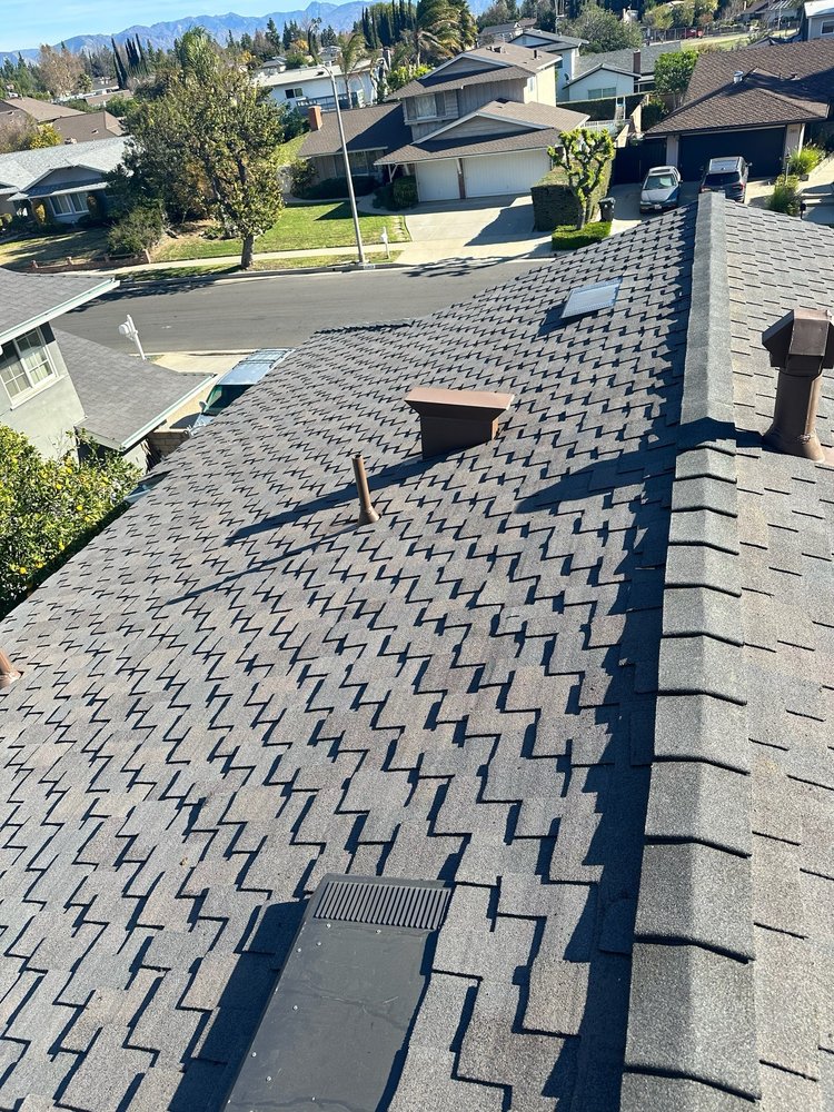 Slide of Alpha Roofing Group