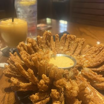 Outback Steakhouse - Photo of my blooming onion and the Wallaby Darned frosty cocktail - Steakhouses Near Me - Wilton, Connecticut