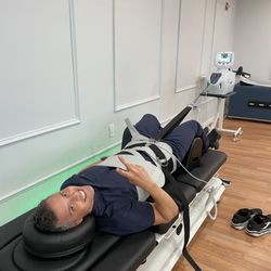 Miami Chiropractic & Wellness - Dr.Karim doing lower back spinal decompression