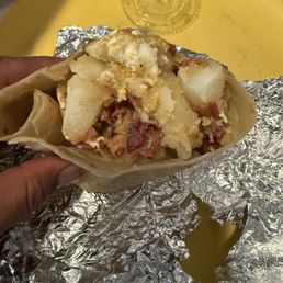 Breakfast burrito of mostly potatoes Breakfast burrito of mostly potatoes