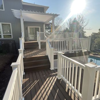 Monk's Design Studio - Multi-level composite deck and pergola surrounding in-ground pool. - Kitchen & Bath Near Me - Morristown, New Jersey Monk's Design Studio - Multi-level composite deck and pergola surrounding in-ground pool. - Kitchen & Bath Near Me - Morristown, New Jersey