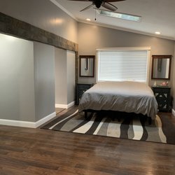 Evergreen Horizon, LLC - Master Bedroom Remodel with Slate Tile Accents Covering Support Beam & Inside of Skylights