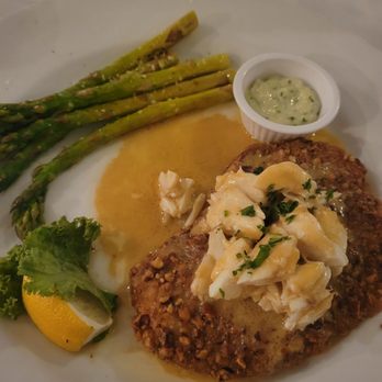 Gaido's - Pecan and crusted mahi mahi with crab on top. - Seafood Near Me - Galveston, Texas Gaido's - Pecan and crusted mahi mahi with crab on top. - Seafood Near Me - Galveston, Texas