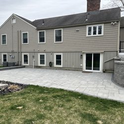 Coastal Landscaping and Masonry - Paver patio and retaining walls.