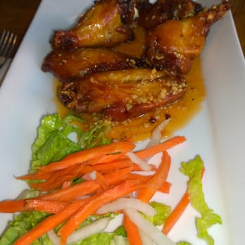 Papaya - Honey Garlic Chicken Wings. Perfectly crispy and saucy all at once. - Vietnamese Near Me - Renton, Washington