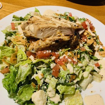 Perfect Pear Bistro - Chopped salad filled with avocado, tomatoes, southwest sauces, raisins, nuts. - New American Near Me - Tempe, Arizona Perfect Pear Bistro - Chopped salad filled with avocado, tomatoes, southwest sauces, raisins, nuts. - New American Near Me - Tempe, Arizona