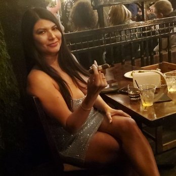 Helios Cigar Lounge - My friend enjoying the cigar - Tobacco Shops Near Me - Riverside, California Helios Cigar Lounge - My friend enjoying the cigar - Tobacco Shops Near Me - Riverside, California