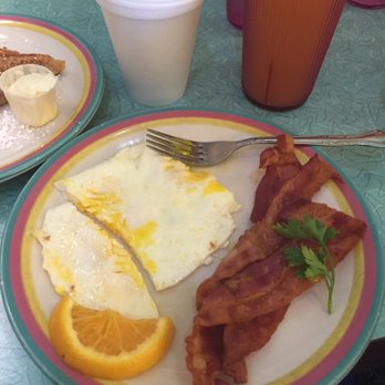 Sugar n' Spice - Two eggs suppose to be over medium well not hard with some yolk left. One was near perfect the other was cooked too hard. - Breakfast & Brunch Near Me - Cincinnati, Ohio Sugar n' Spice - Two eggs suppose to be over medium well not hard with some yolk left. One was near perfect the other was cooked too hard. - Breakfast & Brunch Near Me - Cincinnati, Ohio