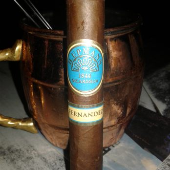 Islands Cigar Lounge - The beautiful turquoise blue caught my eye, I never had this cigar before. It was smooth. From Nicaragua - Tobacco Shops Near Me - Brea, California