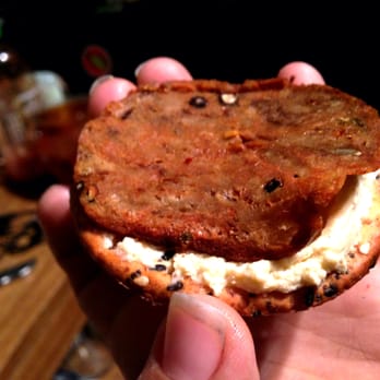 Vromage - muenster cheese on a cracker topped with peppery seitan - Cheese Shops Near Me - Los Angeles, California Vromage - muenster cheese on a cracker topped with peppery seitan - Cheese Shops Near Me - Los Angeles, California
