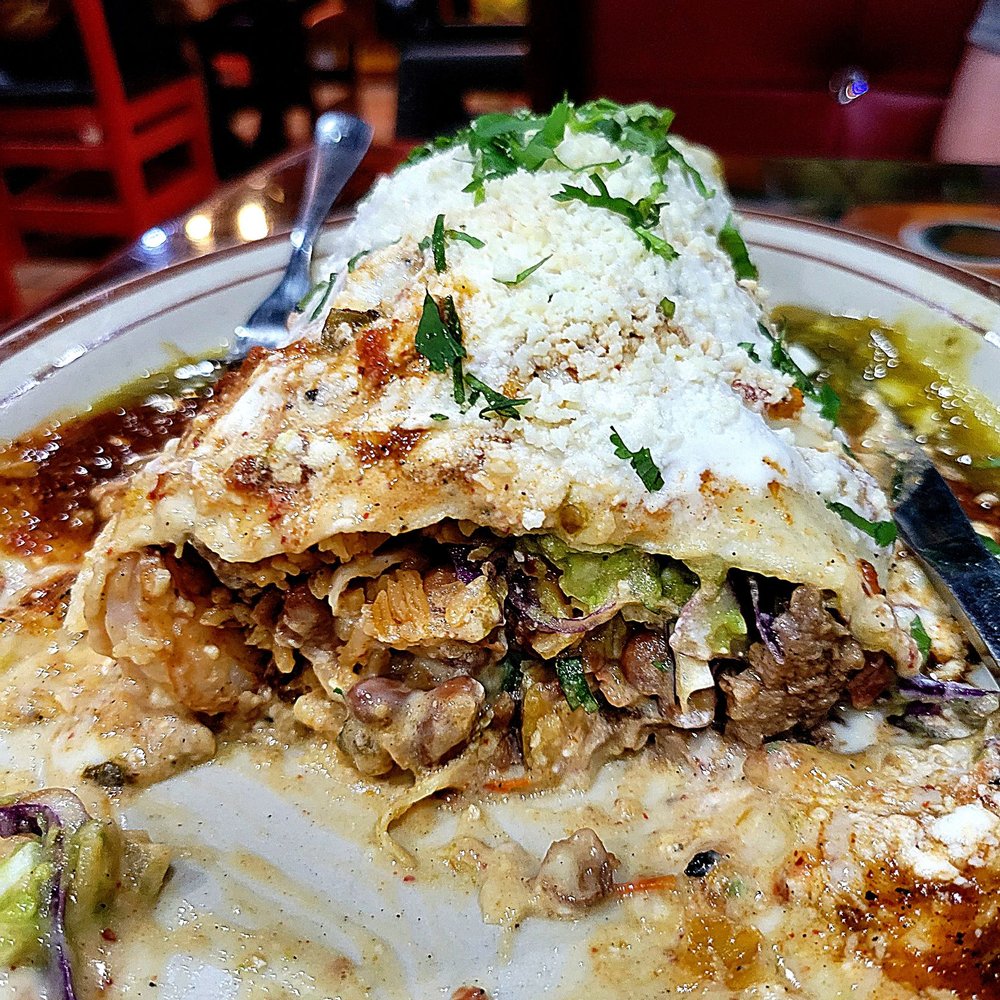 El Paso Mexican Restaurant - Jose's Mariachi Burrito. Steak, chicken, shrimp, rice, cabbage, charro beans, avocado, cheese, and pico de gallo. Topped with three salsas. - Mexican Near Me - Springfield, Virginia El Paso Mexican Restaurant - Jose's Mariachi Burrito. Steak, chicken, shrimp, rice, cabbage, charro beans, avocado, cheese, and pico de gallo. Topped with three salsas. - Mexican Near Me - Springfield, Virginia
