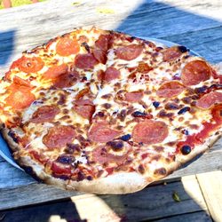 Smoky Mountain Bakers - Pepperoni and sun dried tomato pizza