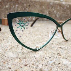 Optical Arts - Beautiful green frame with custom tattoo & crystals