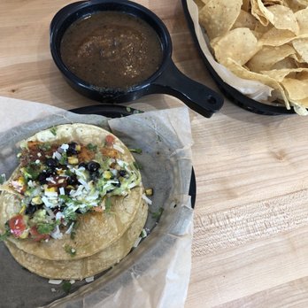 Torchy's Tacos - the Mr. Orange (with a bite out of it) and a side of Chips & Salsa - Tex-Mex Near Me - Houston, Texas Torchy's Tacos - the Mr. Orange (with a bite out of it) and a side of Chips & Salsa - Tex-Mex Near Me - Houston, Texas