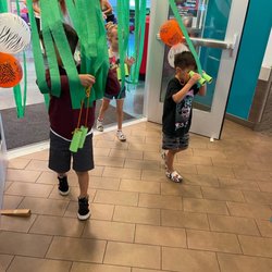 Lathrop Generations Center - Looking for animals on their safari with special made binoculars