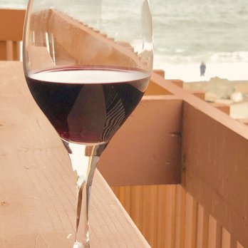 Lighthouse Hotel - Enjoying a Cabernet, courtesy the Moonraker restaurant while taking in the ocean view from my Juliet balcony. - Hotels Near Me - Pacifica, California