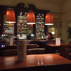 Garfunkels Restaurants - Beautiful bar well lit and decorated for Christmas