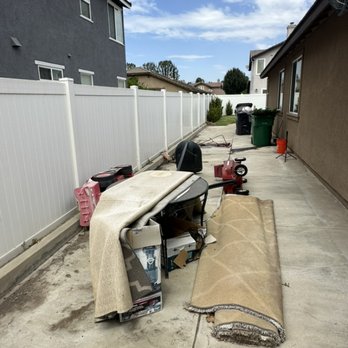 Rocket Junk Removal Services - Before removal -- preparing to safely haul away unwanted furniture and debris. Here in Chino CA - Junk Removal & Hauling Near Me Rocket Junk Removal Services - Before removal -- preparing to safely haul away unwanted furniture and debris. Here in Chino CA - Junk Removal & Hauling Near Me