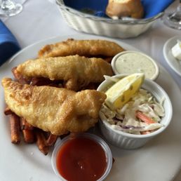 Fish and chip with added in sweet potato fries instead Fish and chip with added in sweet potato fries instead