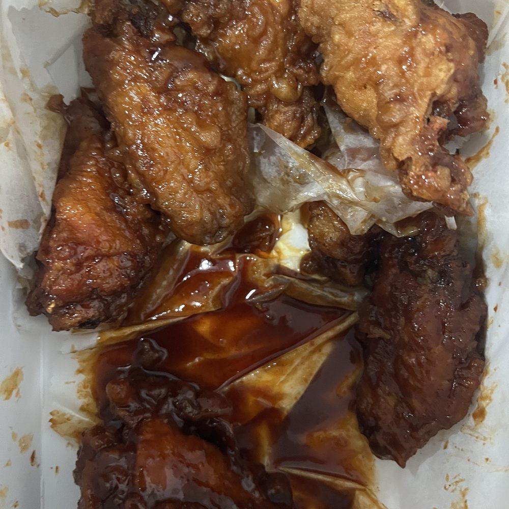 Bonchon - The wings are not prepared properly the way Bon Chon instructs. Some are dry and some are drenched and there is a puddle. - Chicken Wings Near Me - Brooklyn, New York