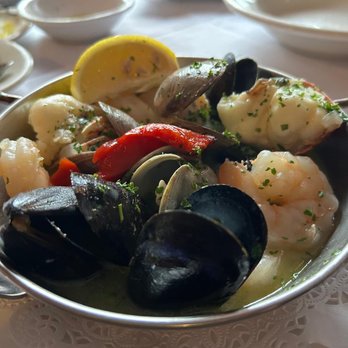 Sangria Y Tapas - Mussels, clams, shrimp, scallops and a lobster in a white wine sauce... - Tapas Bars Near Me - Westlake, Ohio Sangria Y Tapas - Mussels, clams, shrimp, scallops and a lobster in a white wine sauce... - Tapas Bars Near Me - Westlake, Ohio