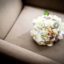Debbie's Floral Shoppe - How Debbies incorporated my family broaches into my wedding bouquet. I couldn't have been happier.