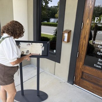 Encino - Checking out the brunch menu. - Steakhouses Near Me - Greenville, North Carolina Encino - Checking out the brunch menu. - Steakhouses Near Me - Greenville, North Carolina