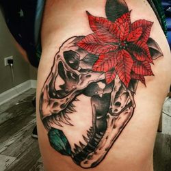 Seas The Day Tattoo and Piercing - Dino skull by Ashley Wentzloff