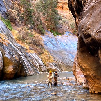 Zion Guru - Walking through the Narrows as Zion National Park - Bike Rentals Near Me - Springdale, Utah Zion Guru - Walking through the Narrows as Zion National Park - Bike Rentals Near Me - Springdale, Utah