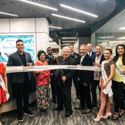 Golden Openings - Ribbon cutting ceremony at our new location. The personalized ribbon got so many compliments!