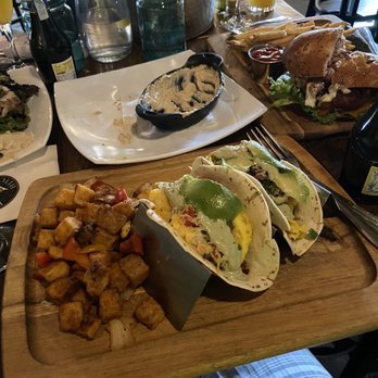 Blackwall Hitch - Tex-Mex brunch taco with a glimpse of the mimosa bucket - New American Near Me - Baltimore, Maryland
