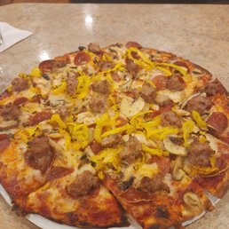 Medium pizza - pepperoni, sausage, mushrooms, banana peppers