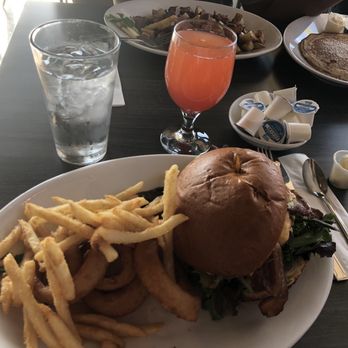 Hot off the Griddle - Farmers burger (bottom), Sunrise Mimosa (center), Corn Beef Hash and a Giant Pancake (top) - Breakfast & Brunch Near Me - Rocklin, California