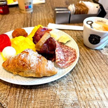 DoubleTree by Hilton Rome Monti - Mamalia cafe adjacent to the lobby offers a tasty breakfast buffet. Of course it includes expressos & cappuccinos. - Hotels Near Me - Rome, RM