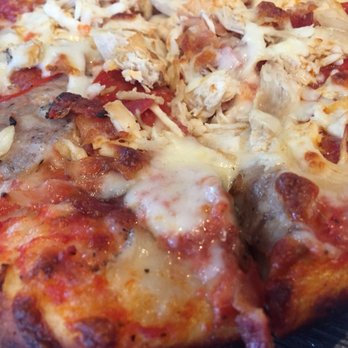 Slyce Madeira Beach - Close up of pizza - Pizza Near Me - Madeira Beach, Florida Slyce Madeira Beach - Close up of pizza - Pizza Near Me - Madeira Beach, Florida