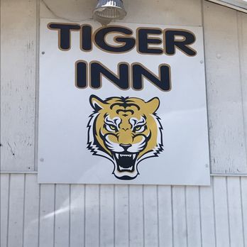 Tiger Inn - a tiger head on the side of a building - Fast Food Near Me - Loreauville, Louisiana Tiger Inn - a tiger head on the side of a building - Fast Food Near Me - Loreauville, Louisiana